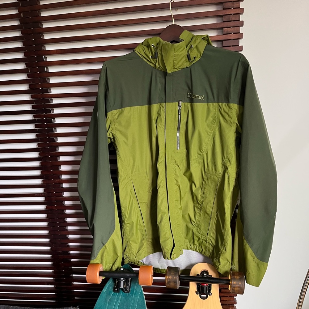 Marmot green rain shell jacket with hood. Size M mens.